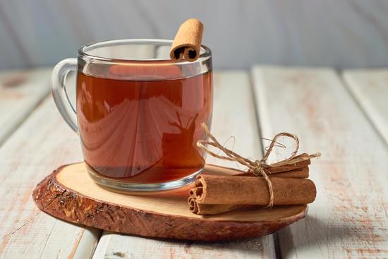 A cup of tea, Cinnamon tea, Cinnamon drink with cinnamon stick