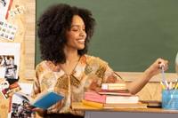 Teacher leading a lively classroom conversation